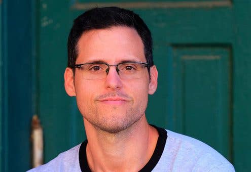 Headshot of Adam Sud, founder of Plant-Based for Positive Change