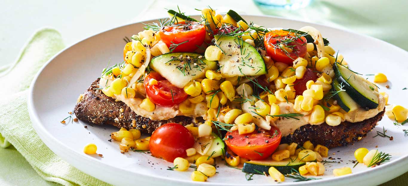 Dilled Veggie Toasts on a white plate