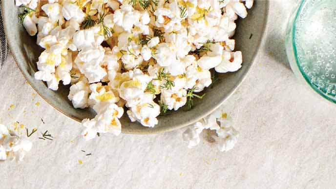 Pickle Popcorn in a beige ceramic bowl