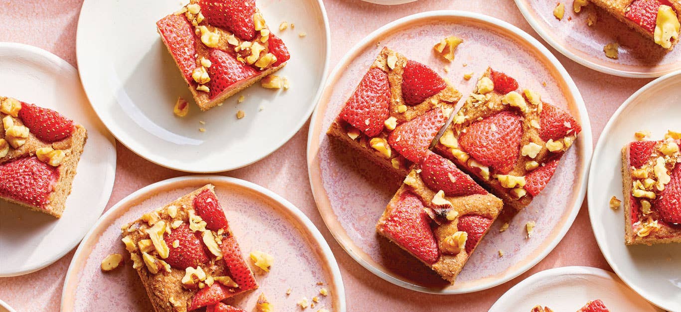 Vegan Strawberry Blondies on light pink ceramic plates